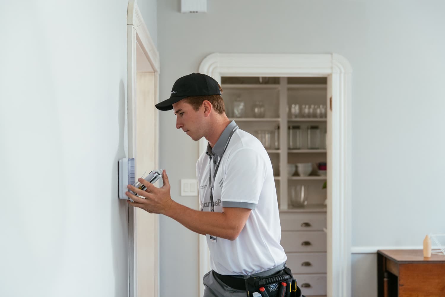 Home service technician completing an on-site installation